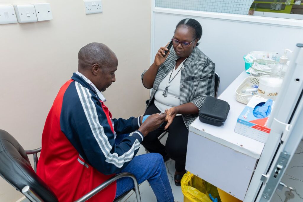 Clinician attending to a patient at Josma Health