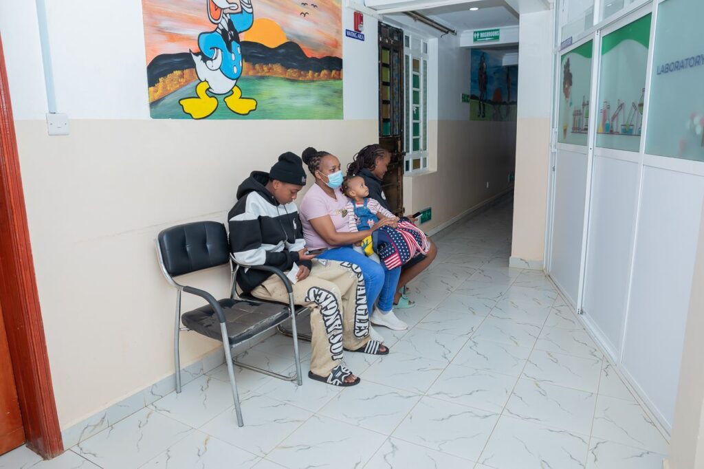 Family in the waiting area at Josma Health children's hospital