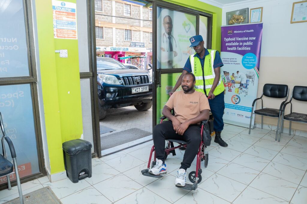 Staff assisting a patient arriving at Josma Health