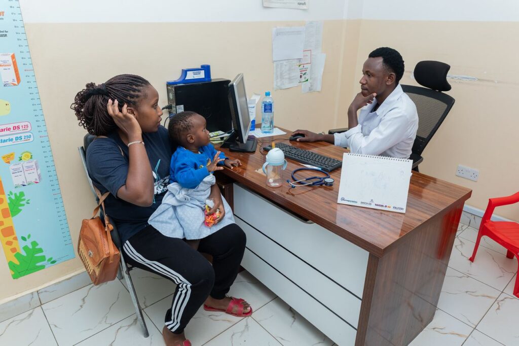 Mother and baby consulting a doctor at Josma Health
